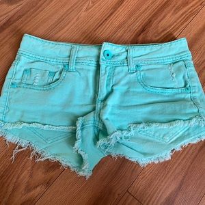 Teal jean shorts